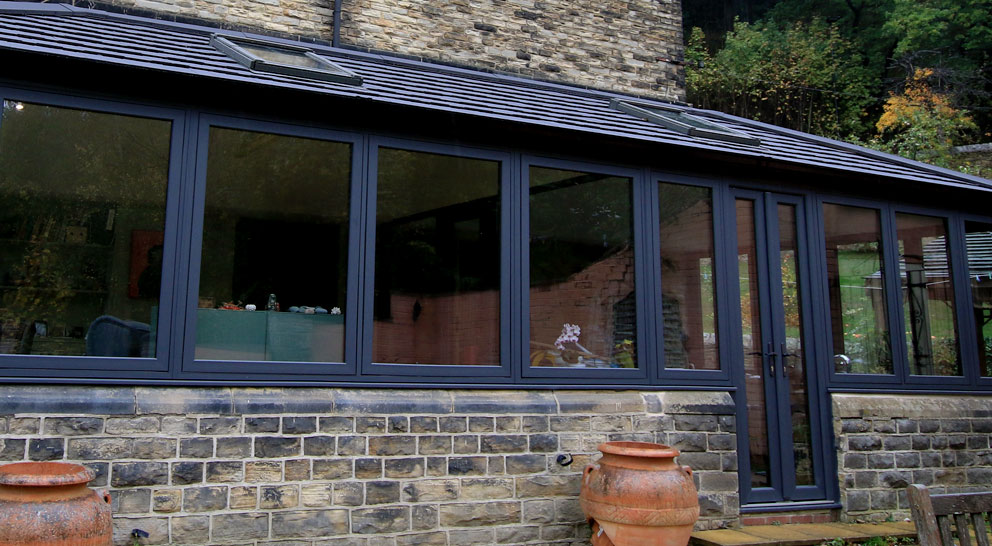 Lean to conservatory with dark frame