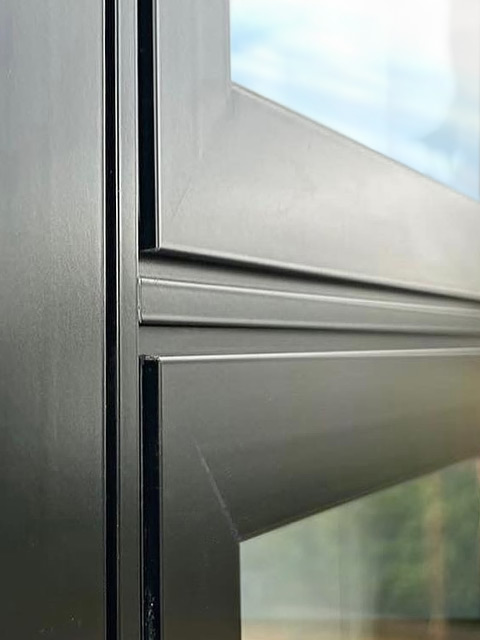 Closeup of a grey aluminium window frame