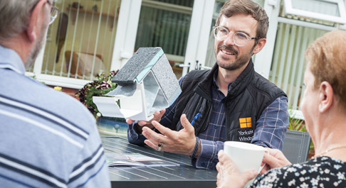 Yorkshire Windows salesman discussing solid conservatory roofs