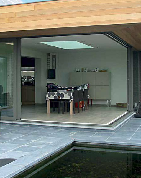 Grey aluminum sliding kitchen doors open.jpg